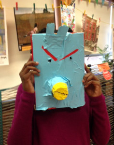 This student has already moved forward in decorating her mask, here with added elements and colorful duct tape